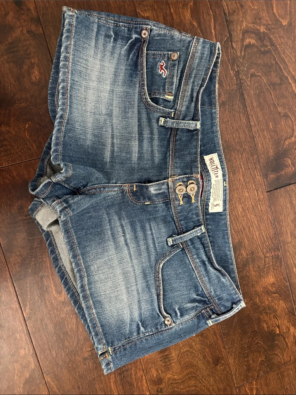 Hollister low-rise shorts, never worn. Tags still attached, size 5. - Picture 1 of 4